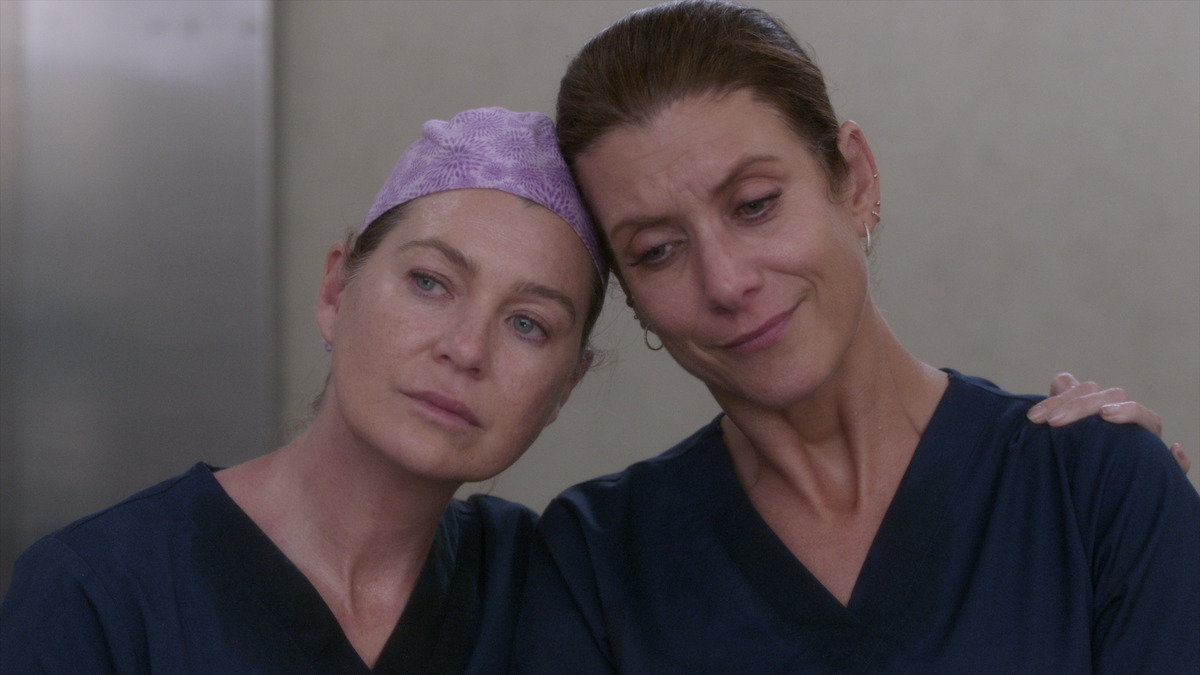 Meredith and Addison embracing