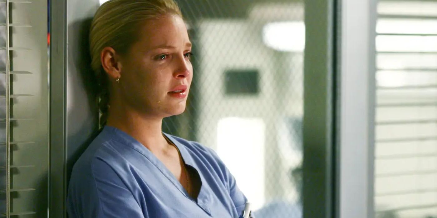 Katherine Heigl as Izzie Stevens in Grey's Anatomy, crying against a wall